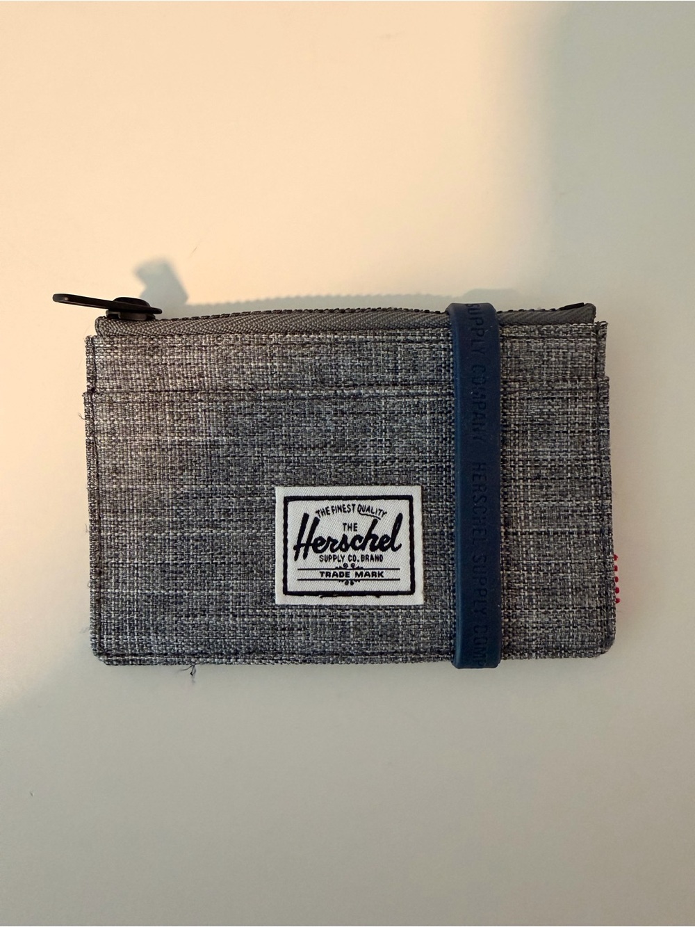 Herschel Supply Co. Gray Wallet with Navy Elastic Strap